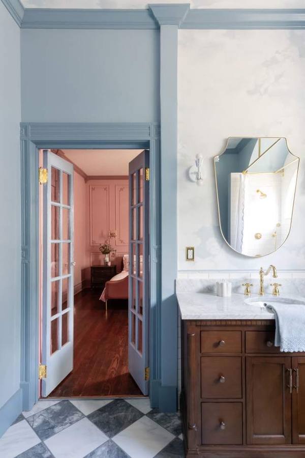 Blue bath with cloud ceiling looking into the Pink Room